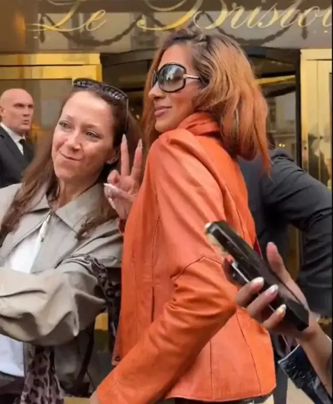 Paris Fashion Week Lara Raj Orange Jacket
